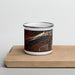 Front View Custom Boulder Lake Wyoming Map Enamel Mug in Ember on Cutting Board