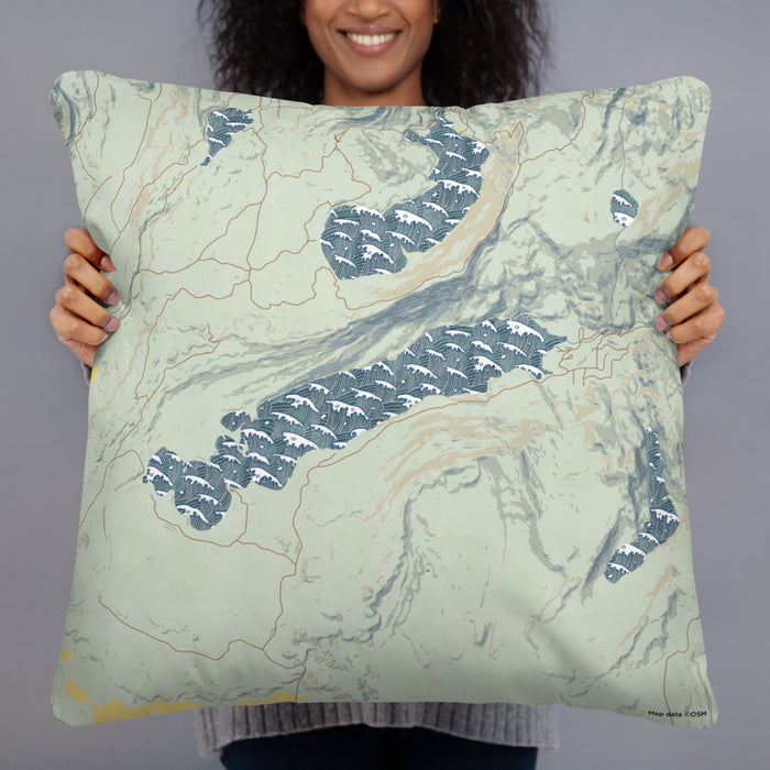 Person holding 22x22 Custom Boulder Lake Wyoming Map Throw Pillow in Woodblock
