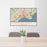 24x36 Bridgeport Connecticut Map Print Lanscape Orientation in Woodblock Style Behind 2 Chairs Table and Potted Plant