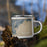 Right View Custom Bridgeport Connecticut Map Enamel Mug in Afternoon on Grass With Trees in Background