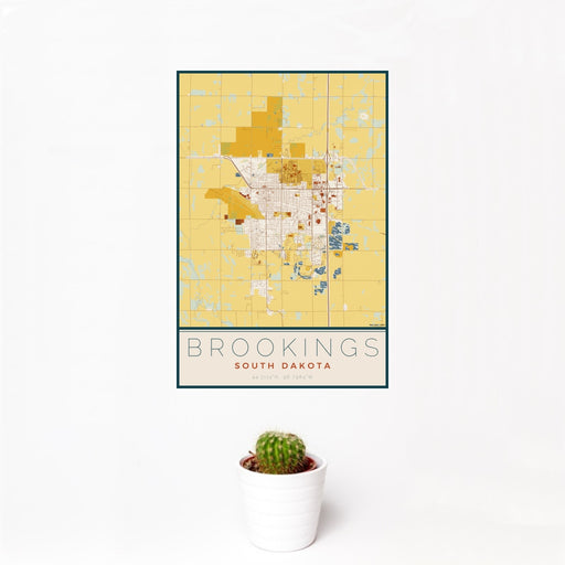 12x18 Brookings South Dakota Map Print Portrait Orientation in Woodblock Style With Small Cactus Plant in White Planter