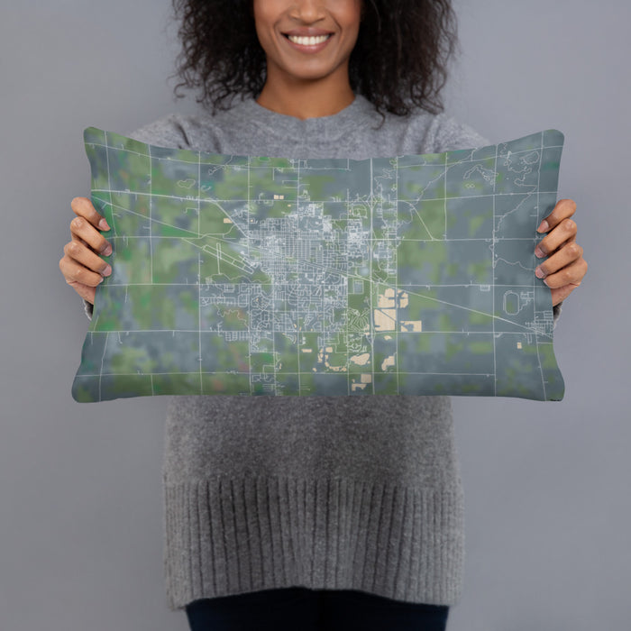 Person holding 20x12 Custom Brookings South Dakota Map Throw Pillow in Afternoon