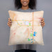 Person holding 18x18 Custom Brookings South Dakota Map Throw Pillow in Watercolor