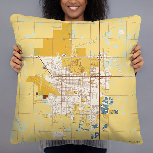 Person holding 22x22 Custom Brookings South Dakota Map Throw Pillow in Woodblock