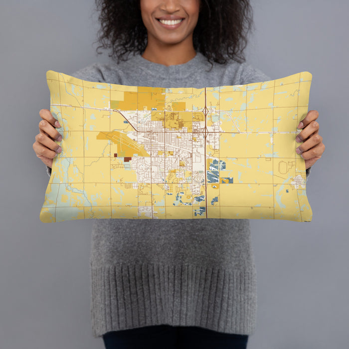 Person holding 20x12 Custom Brookings South Dakota Map Throw Pillow in Woodblock