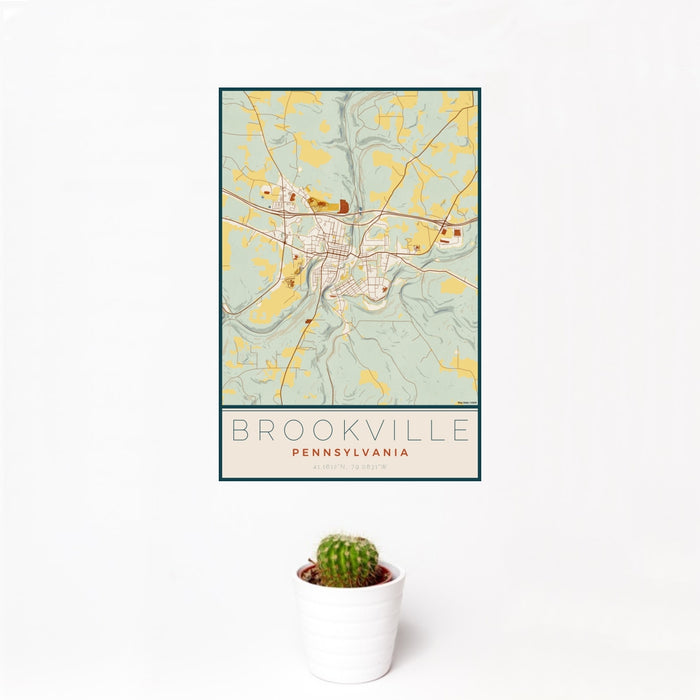 12x18 Brookville Pennsylvania Map Print Portrait Orientation in Woodblock Style With Small Cactus Plant in White Planter