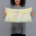 Person holding 20x12 Custom Brookville Pennsylvania Map Throw Pillow in Woodblock