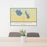 24x36 Burlington Kansas Map Print Lanscape Orientation in Woodblock Style Behind 2 Chairs Table and Potted Plant