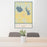 24x36 Burlington Kansas Map Print Portrait Orientation in Woodblock Style Behind 2 Chairs Table and Potted Plant