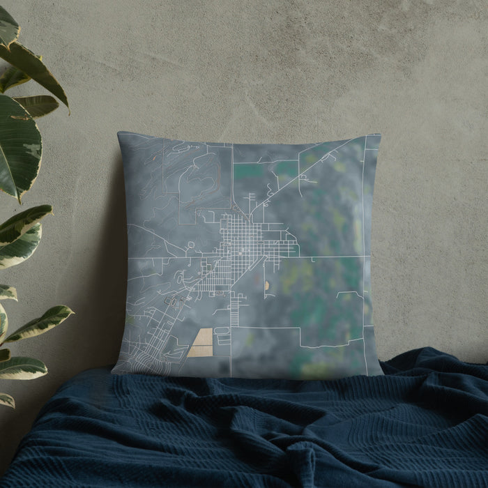 Custom Burns Oregon Map Throw Pillow in Afternoon on Bedding Against Wall