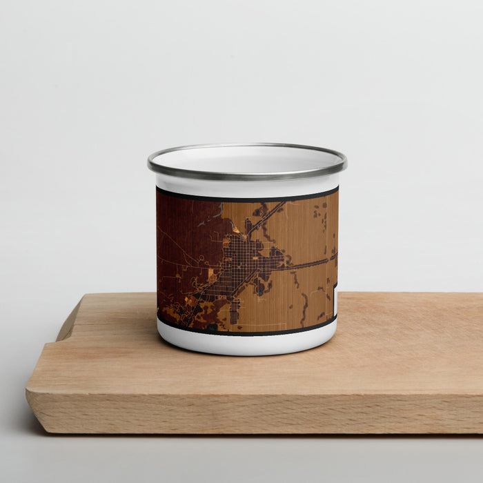 Front View Custom Burns Oregon Map Enamel Mug in Ember on Cutting Board