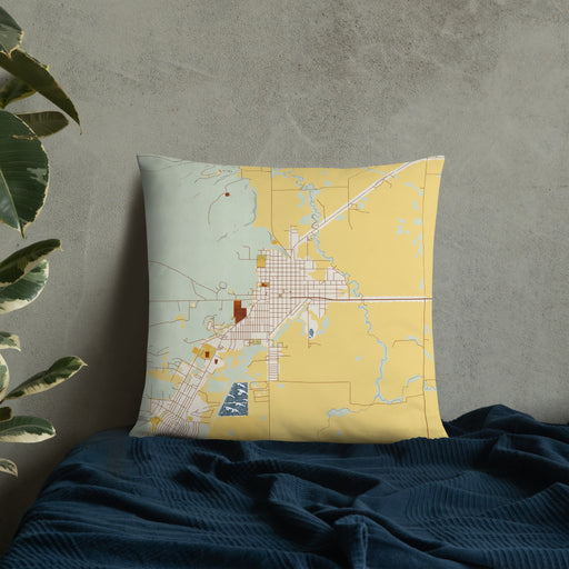 Custom Burns Oregon Map Throw Pillow in Woodblock on Bedding Against Wall