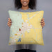 Person holding 18x18 Custom Burns Oregon Map Throw Pillow in Woodblock