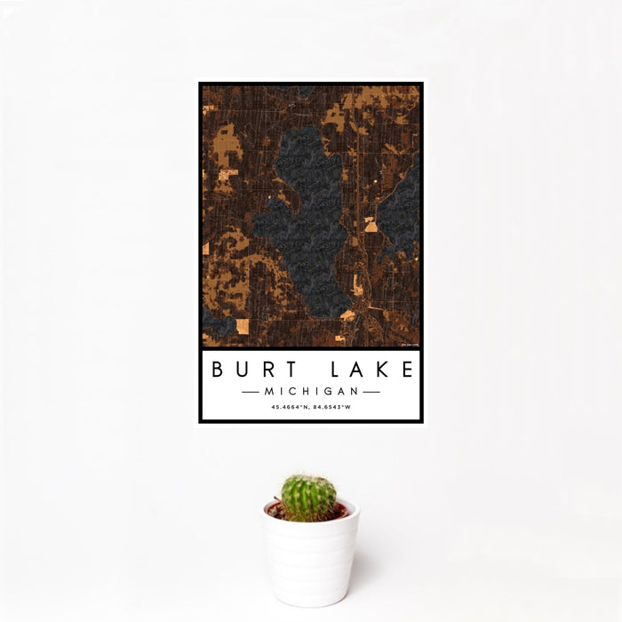12x18 Burt Lake Michigan Map Print Portrait Orientation in Ember Style With Small Cactus Plant in White Planter
