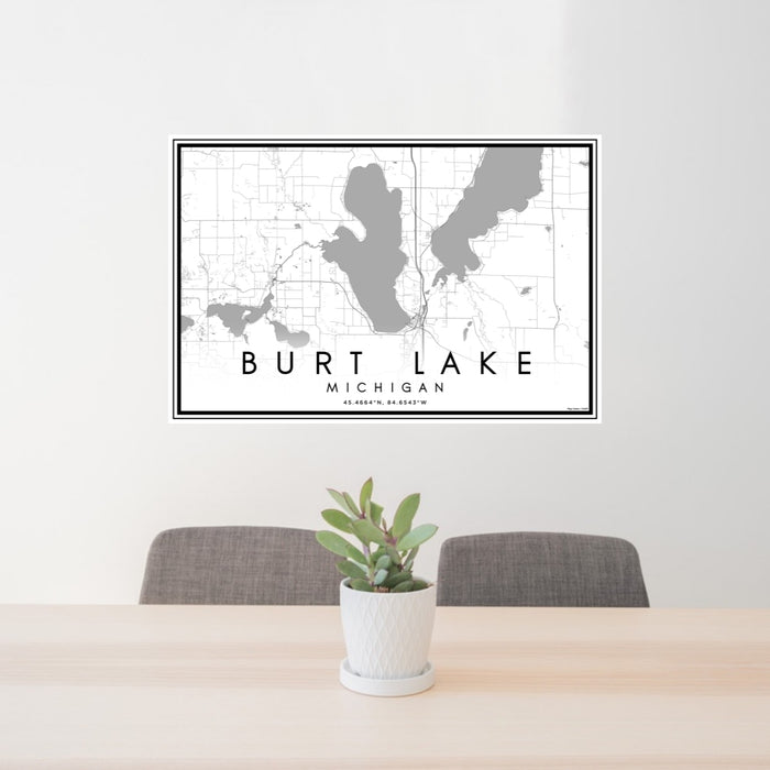 24x36 Burt Lake Michigan Map Print Landscape Orientation in Classic Style Behind 2 Chairs Table and Potted Plant