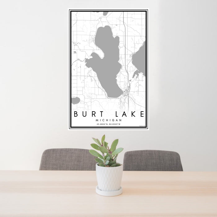 24x36 Burt Lake Michigan Map Print Portrait Orientation in Classic Style Behind 2 Chairs Table and Potted Plant