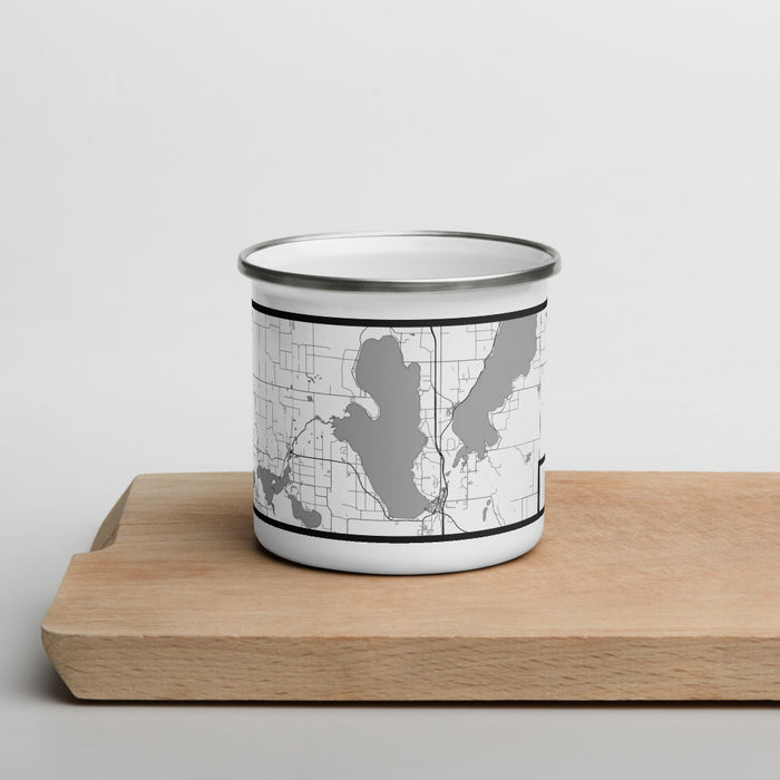 Front View Custom Burt Lake Michigan Map Enamel Mug in Classic on Cutting Board