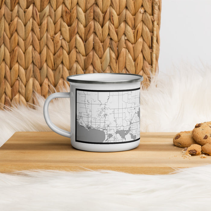 Left View Custom Burt Lake Michigan Map Enamel Mug in Classic on Table Top