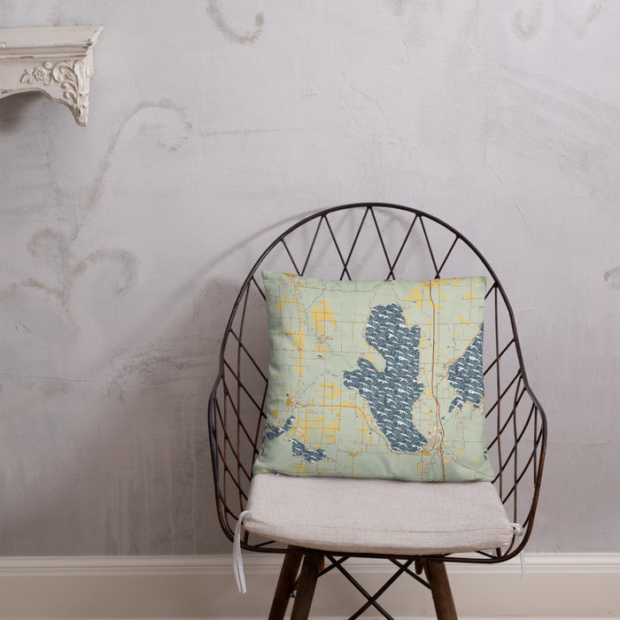 Custom Burt Lake Michigan Map Throw Pillow in Woodblock on Cream Colored Couch