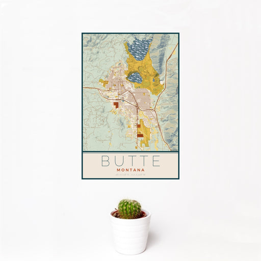 12x18 Butte Montana Map Print Portrait Orientation in Woodblock Style With Small Cactus Plant in White Planter