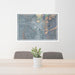 24x36 Butte Montana Map Print Lanscape Orientation in Afternoon Style Behind 2 Chairs Table and Potted Plant