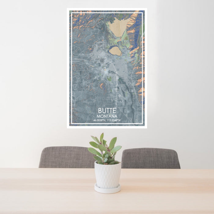 24x36 Butte Montana Map Print Portrait Orientation in Afternoon Style Behind 2 Chairs Table and Potted Plant