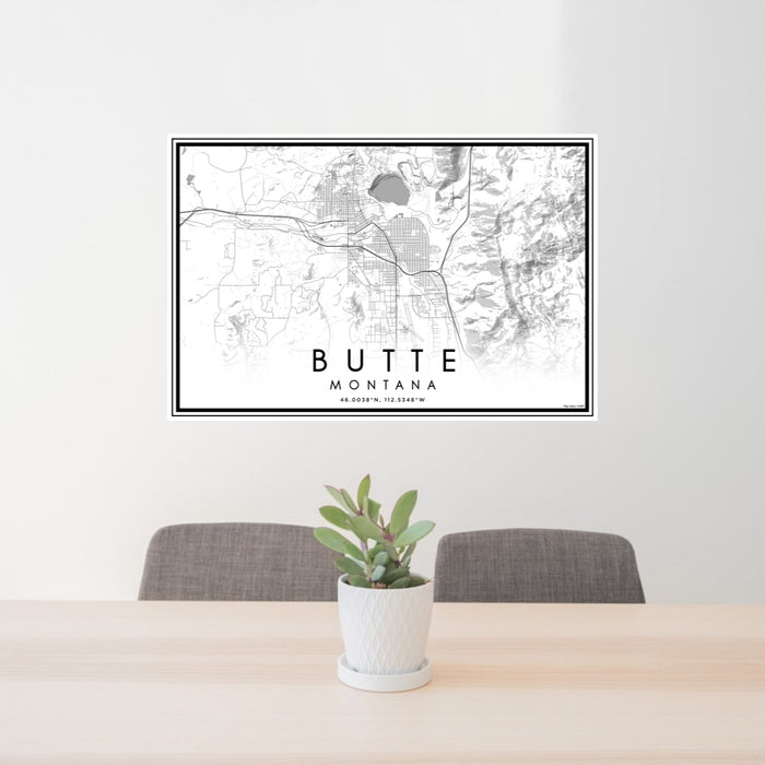 24x36 Butte Montana Map Print Lanscape Orientation in Classic Style Behind 2 Chairs Table and Potted Plant