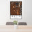 24x36 Butte Montana Map Print Portrait Orientation in Ember Style Behind 2 Chairs Table and Potted Plant