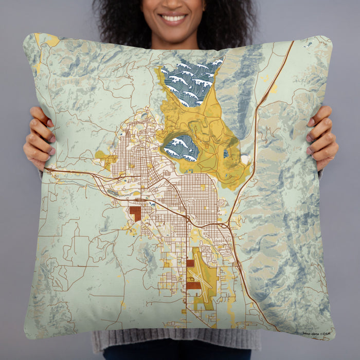 Person holding 22x22 Custom Butte Montana Map Throw Pillow in Woodblock