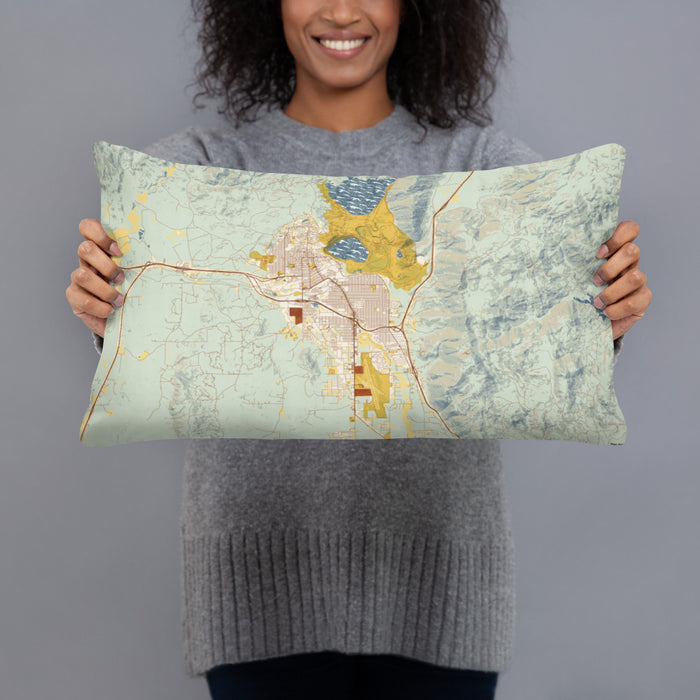 Person holding 20x12 Custom Butte Montana Map Throw Pillow in Woodblock