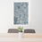 24x36 Calgary Alberta Map Print Portrait Orientation in Afternoon Style Behind 2 Chairs Table and Potted Plant