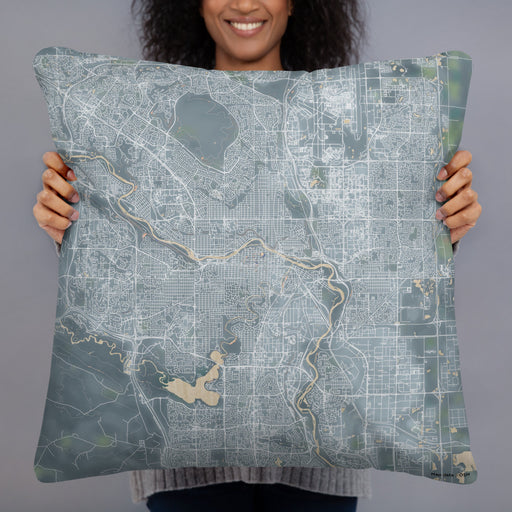 Person holding 22x22 Custom Calgary Alberta Map Throw Pillow in Afternoon