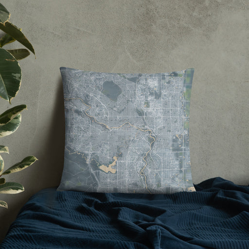 Custom Calgary Alberta Map Throw Pillow in Afternoon on Bedding Against Wall