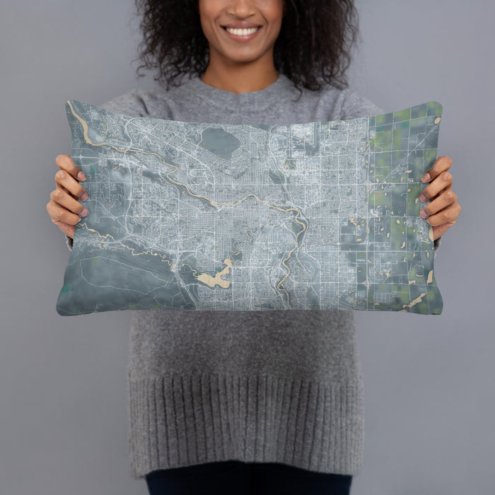Person holding 20x12 Custom Calgary Alberta Map Throw Pillow in Afternoon