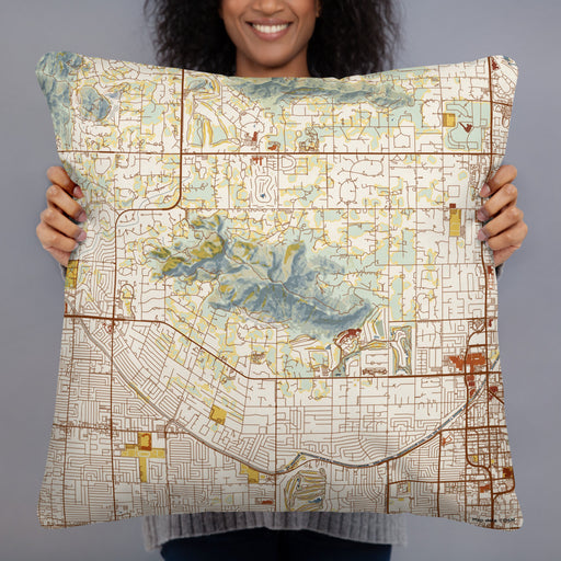 Person holding 22x22 Custom Camelback Mountain Arizona Map Throw Pillow in Woodblock