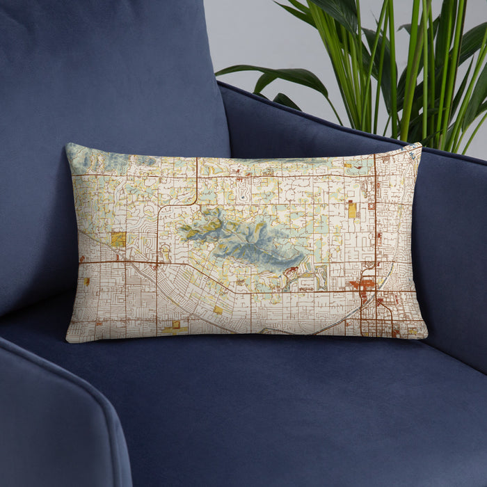 Custom Camelback Mountain Arizona Map Throw Pillow in Woodblock on Blue Colored Chair