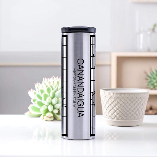 Canandaigua New York Custom City Map Inscription Coordinates on 17oz Stainless Steel Insulated Tumbler in Tactile Lines with Succulent in Background