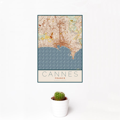 12x18 Cannes France Map Print Portrait Orientation in Woodblock Style With Small Cactus Plant in White Planter