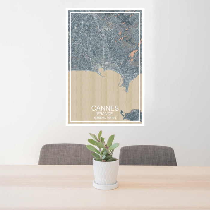 24x36 Cannes France Map Print Portrait Orientation in Afternoon Style Behind 2 Chairs Table and Potted Plant