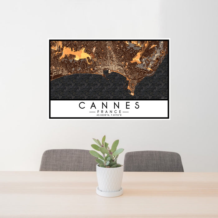 24x36 Cannes France Map Print Landscape Orientation in Ember Style Behind 2 Chairs Table and Potted Plant