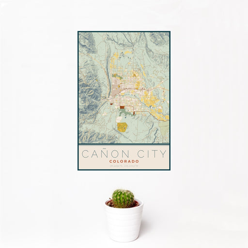 12x18 Cañon City Colorado Map Print Portrait Orientation in Woodblock Style With Small Cactus Plant in White Planter