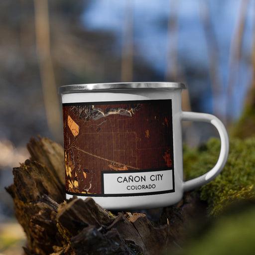Right View Custom Cañon City Colorado Map Enamel Mug in Ember on Grass With Trees in Background