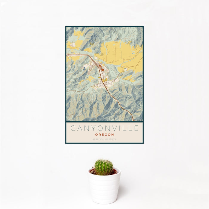 12x18 Canyonville Oregon Map Print Portrait Orientation in Woodblock Style With Small Cactus Plant in White Planter
