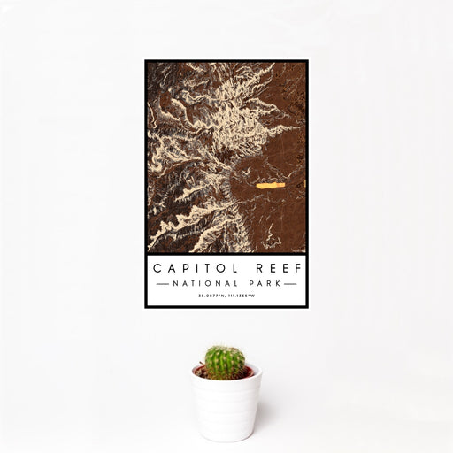 12x18 Capitol Reef National Park Map Print Portrait Orientation in Ember Style With Small Cactus Plant in White Planter