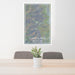 24x36 Capitol Reef National Park Map Print Portrait Orientation in Afternoon Style Behind 2 Chairs Table and Potted Plant