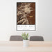 24x36 Capitol Reef National Park Map Print Portrait Orientation in Ember Style Behind 2 Chairs Table and Potted Plant
