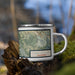 Right View Custom Carmel Highlands California Map Enamel Mug in Woodblock on Grass With Trees in Background