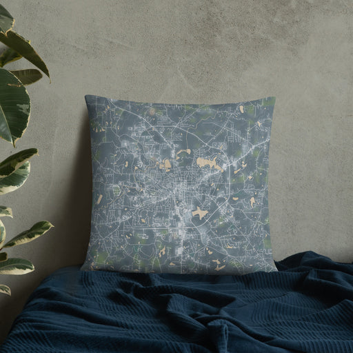 Custom Carrollton Georgia Map Throw Pillow in Afternoon on Bedding Against Wall