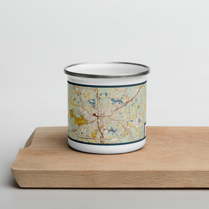 Front View Custom Carrollton Georgia Map Enamel Mug in Woodblock on Cutting Board