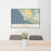 24x36 Central Coast California Map Print Lanscape Orientation in Woodblock Style Behind 2 Chairs Table and Potted Plant